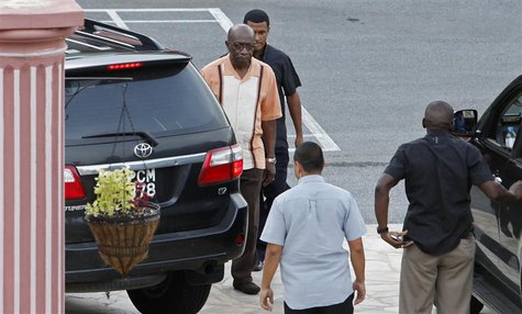 Trinidad and Tobago's National Security Minister Jack Warner leaves with bodyguards after an emergency cabinet meeting at the private reside Trinidad and Tobago's National Security Minister Jack Warner leaves with bodyguards after an emergency cabinet meeting at the private reside