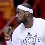 Miami Heat small forward LeBron James reacts to a teammate's score in the fourth quarter of the Heat's win over the Milwaukee Bucks in their