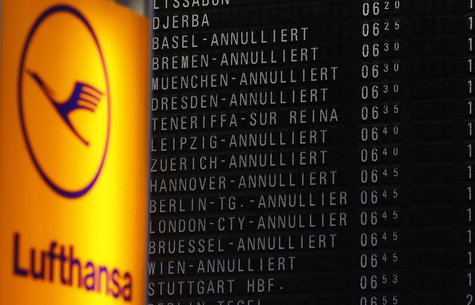 Cancelled flights are seen on a flight schedule board next to the logo of German air carrier Lufthansa at the Fraport airport in Frankfurt, Cancelled flights are seen on a flight schedule board next to the logo of German air carrier Lufthansa at the Fraport airport in Frankfurt,