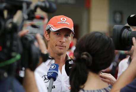 McLaren Formula One driver Jenson Button of Britain speaks with the media ahead of the Bahrain F1 Grand Prix at the Sakhir circuit in Manama McLaren Formula One driver Jenson Button of Britain speaks with the media ahead of the Bahrain F1 Grand Prix at the Sakhir circuit in Manama