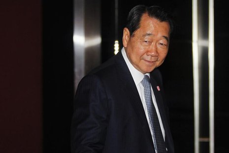 Dhanin Chearavanont, chairman of Thailand's largest agribusiness group, Charoen Pokphand Food, arrives at a Thailand-China Business Council Dhanin Chearavanont, chairman of Thailand's largest agribusiness group, Charoen Pokphand Food, arrives at a Thailand-China Business Council