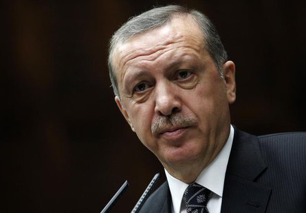 Turkey's Prime Minister Tayyip Erdogan addresses members of parliament from his ruling AK Party (AKP) during a meeting at the Turkish parlia Turkey's Prime Minister Tayyip Erdogan addresses members of parliament from his ruling AK Party (AKP) during a meeting at the Turkish parlia
