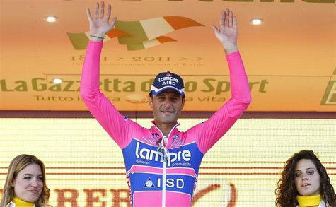 Alessandro Petacchi of Italy celebrates on the podium after winning the 244km second stage of the Giro d'Italia cycling race from Alba to Pa Alessandro Petacchi of Italy celebrates on the podium after winning the 244km second stage of the Giro d'Italia cycling race from Alba to Pa