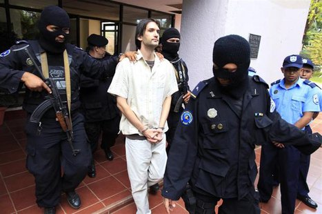 Eric Justin Toth of the U.S. is escorted after a presentation to the media at police headquarters building in Managua April 22, 2013. REUTER Eric Justin Toth of the U.S. is escorted after a presentation to the media at police headquarters building in Managua April 22, 2013. REUTER