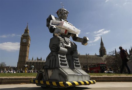 A robot is pictured in front of the Houses of Parliament and Westminster Abbey as part of the Campaign to Stop Killer Robots in London April A robot is pictured in front of the Houses of Parliament and Westminster Abbey as part of the Campaign to Stop Killer Robots in London April