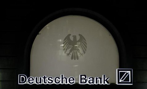 The logo of Germany's largest business bank, Deutsche Bank, is illuminated at the bank's original headquarters in Frankfurt January 31, 2012 The logo of Germany's largest business bank, Deutsche Bank, is illuminated at the bank's original headquarters in Frankfurt January 31, 2012