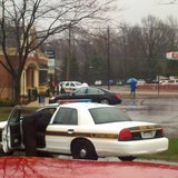 Ottawa Co. Sheriff's Deputies investigate a bank robber at the Macatawa Bank branch on Butternut Drive in Holland Twp. on Apr. 23, 2013.