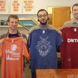 Joey Carty (second from left) displays his winning design, flanked to his left by runners-up Tony Putt and Dan Flemming, at the conclusion of the first Tulip Time Festival T-Shirt Design Contest on Apr. 22, 2013. Joey Carty (second from left) displays his winning design, flanked to his left by runners-up Tony Putt and Dan Flemming, at the conclusion of the first Tulip Time Festival T-Shirt Design Contest on Apr. 22, 2013.