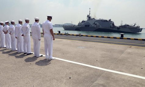U.S. Navy sailors look at the littoral combat ship USS Freedom as it arrives in Changi Naval Base in this April 18, 2013 photo provided by t U.S. Navy sailors look at the littoral combat ship USS Freedom as it arrives in Changi Naval Base in this April 18, 2013 photo provided by t