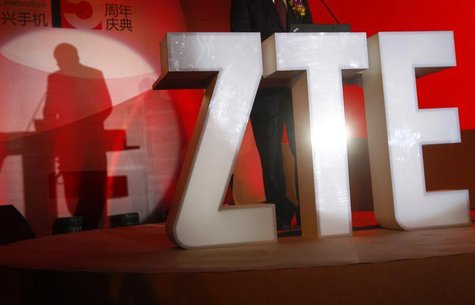 The ZTE company logo is seen as a guest delivers a speech during the company's 15th anniversary celebration in Beijing April 18, 2013. REUTE The ZTE company logo is seen as a guest delivers a speech during the company's 15th anniversary celebration in Beijing April 18, 2013. REUTE