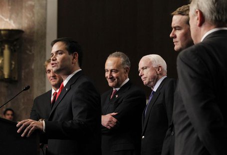 U.S. Senator Marco Rubio (R-FL)(2nd L), part of the Senate's "Gang on Eight", speaks during a news briefing on Capitol Hill in Washington, A U.S. Senator Marco Rubio (R-FL)(2nd L), part of the Senate's "Gang on Eight", speaks during a news briefing on Capitol Hill in Washington, A