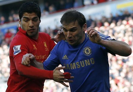 Chelsea's Branislav Ivanovic (R) challenges Liverpool's Luis Suarez during their English Premier League soccer match at Anfield in Liverpool Chelsea's Branislav Ivanovic (R) challenges Liverpool's Luis Suarez during their English Premier League soccer match at Anfield in Liverpool