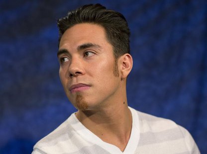 Olympic speed skater Apolo Ohno is seen in New York April 24, 2013. REUTERS/Shannon Stapleton Olympic speed skater Apolo Ohno is seen in New York April 24, 2013. REUTERS/Shannon Stapleton