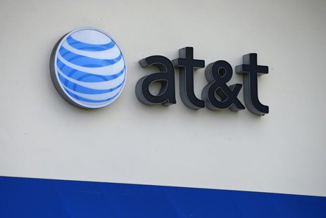 The AT&T logo is pictured by its store in Carlsbad, California, April 22, 2013. REUTERS/Mike Blake The AT&T logo is pictured by its store in Carlsbad, California, April 22, 2013. REUTERS/Mike Blake