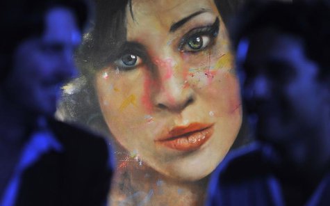 A painting 'Amy' by British artist Johan Andersson is seen hanging at a pub in central London August 23, 2011. REUTERS/Toby Melville A painting 'Amy' by British artist Johan Andersson is seen hanging at a pub in central London August 23, 2011. REUTERS/Toby Melville