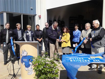 NTC board member Paul Proulx cuts the ribbon on the new Public Safety Center in Merrill NTC board member Paul Proulx cuts the ribbon on the new Public Safety Center in Merrill