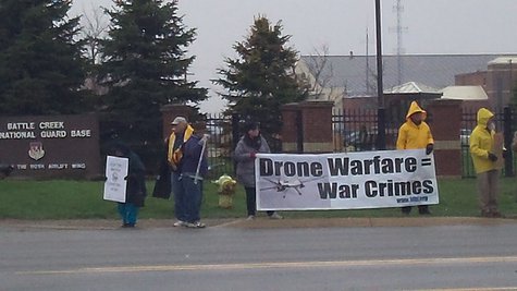 About a dozen protesters appeared in the cold and snow to object to the deployment of the Drone Control Center in Battle Creek About a dozen protesters appeared in the cold and snow to object to the deployment of the Drone Control Center in Battle Creek