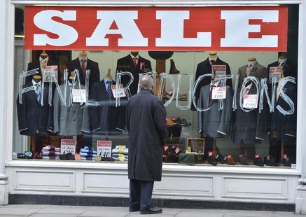 A man looks into a shop window in central London February 27, 2013. REUTERS/Toby Melville A man looks into a shop window in central London February 27, 2013. REUTERS/Toby Melville