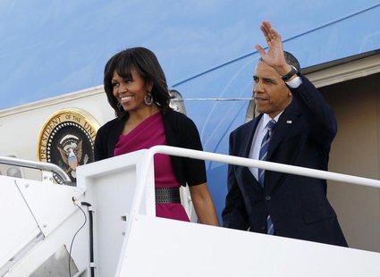 U.S. President Barack Obama waves next to first lady Michelle Obama as they arrive in Dallas April 24, 2013. REUTERS/Jason Reed U.S. President Barack Obama waves next to first lady Michelle Obama as they arrive in Dallas April 24, 2013. REUTERS/Jason Reed