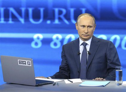 Russian President Vladimir Putin takes part in a live broadcast nationwide phone-in in Moscow April 25, 2013. Putin played down differences Russian President Vladimir Putin takes part in a live broadcast nationwide phone-in in Moscow April 25, 2013. Putin played down differences