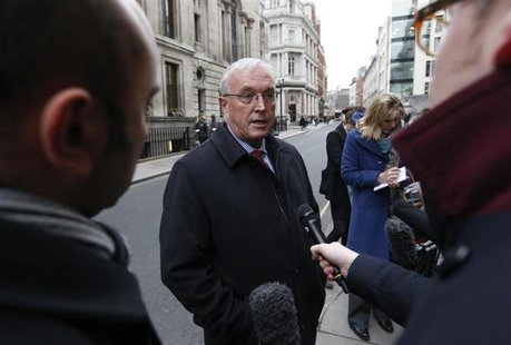Union Cycliste Internationale (UCI) President Pat McQuaid speaks to reporters as he leaves a procedural hearing in London January 25, 2013. Union Cycliste Internationale (UCI) President Pat McQuaid speaks to reporters as he leaves a procedural hearing in London January 25, 2013.