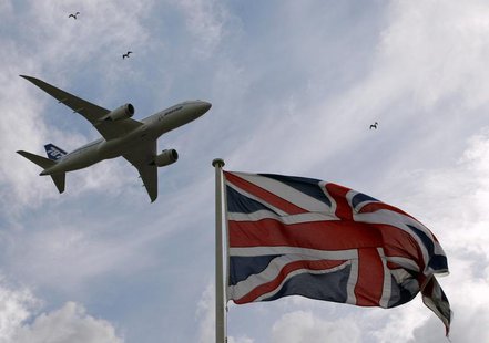A Boeing 787 Dreamliner aircraft flies over a Union flag as it makes a salute to its engine makers Rolls-Royce in Derby, central England Jul A Boeing 787 Dreamliner aircraft flies over a Union flag as it makes a salute to its engine makers Rolls-Royce in Derby, central England Jul