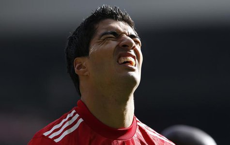 Liverpool's Luis Suarez reacts after missing a chance to score during their English Premier League soccer match against West Bromwich Albion Liverpool's Luis Suarez reacts after missing a chance to score during their English Premier League soccer match against West Bromwich Albion