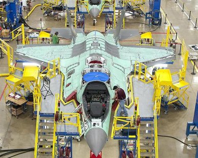 Workers can be seen on the moving line and forward fuselage assembly areas for the F-35 Joint Strike Fighter at Lockheed Martin Corp's facto Workers can be seen on the moving line and forward fuselage assembly areas for the F-35 Joint Strike Fighter at Lockheed Martin Corp's facto