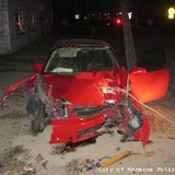 Vehicle damaged by street racing crash in Menasha on April 24, 2013. (courtesy of the City of Menasha Police Department).