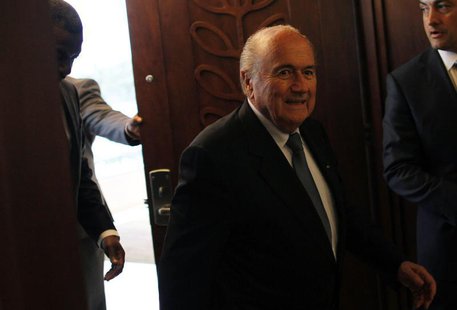 FIFA President Joseph "Sepp" Blatter (C) arrives for a news conference at the CONCACAF congress in Panama City April 19, 2013. REUTERS/Carlo FIFA President Joseph "Sepp" Blatter (C) arrives for a news conference at the CONCACAF congress in Panama City April 19, 2013. REUTERS/Carlo