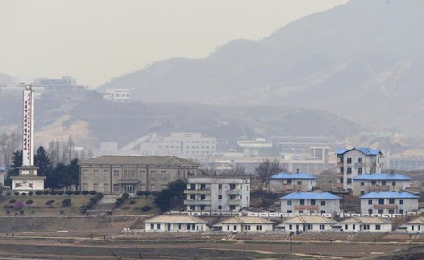 The inter-Korean Kaesong Industrial Complex is seen behind the propaganda village of Gijungdong in North Korea, in this picture taken near t The inter-Korean Kaesong Industrial Complex is seen behind the propaganda village of Gijungdong in North Korea, in this picture taken near t