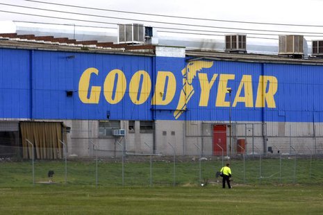 A man walks past the Goodyear logo at the South Pacific Tyres facility in Somerton, Victoria, about 20km from Melbourne, June 26, 2008. REUT A man walks past the Goodyear logo at the South Pacific Tyres facility in Somerton, Victoria, about 20km from Melbourne, June 26, 2008. REUT