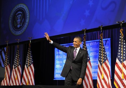 U.S. President Barack Obama waves to guests as he leaves the stage after speaking at the Planned Parenthood National Conference at the Marri U.S. President Barack Obama waves to guests as he leaves the stage after speaking at the Planned Parenthood National Conference at the Marri