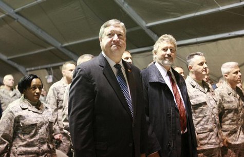 Secretary of the Air Force Michael Donley (L, front) attends a ceremony, marking the 10th anniversary of the presence of the U.S. transit ce Secretary of the Air Force Michael Donley (L, front) attends a ceremony, marking the 10th anniversary of the presence of the U.S. transit ce