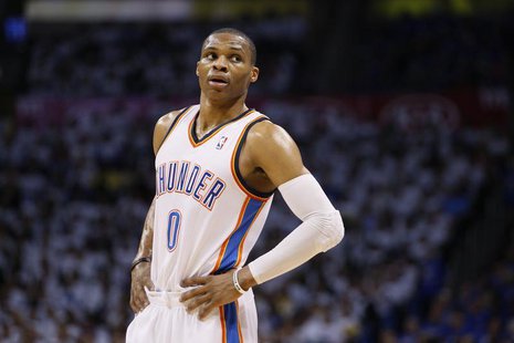 Oklahoma City Thunder guard Russell Westbrook takes a break on the court against the Houston Rockets in the second half of their Game 2 NBA Oklahoma City Thunder guard Russell Westbrook takes a break on the court against the Houston Rockets in the second half of their Game 2 NBA