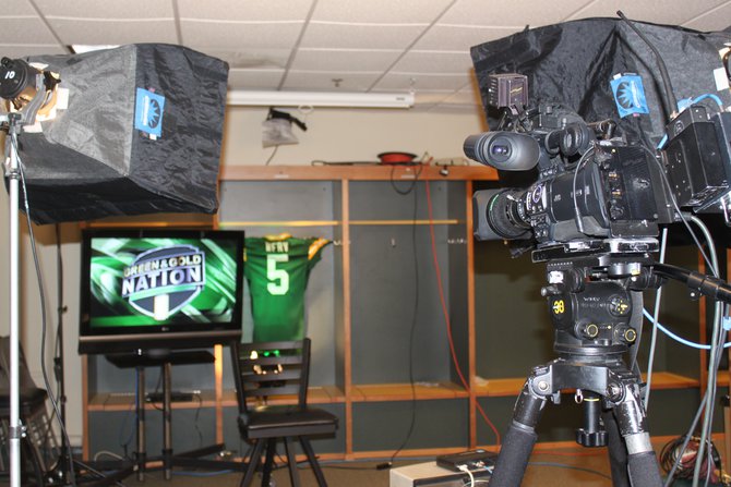 TV stations set up in the visiting team locker room
