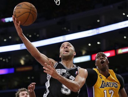 San Antonio Spurs Tony Parker (L) is fouled by Los Angeles Lakers Dwight Howard as he goes up to shoot during Game 3 of their NBA Western Co San Antonio Spurs Tony Parker (L) is fouled by Los Angeles Lakers Dwight Howard as he goes up to shoot during Game 3 of their NBA Western Co