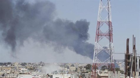 Smoke rises after what activists said was a missile fired by a Syrian Air Force fighter jet loyal to President Bashar al-Assad in Deraa, Apr Smoke rises after what activists said was a missile fired by a Syrian Air Force fighter jet loyal to President Bashar al-Assad in Deraa, Apr