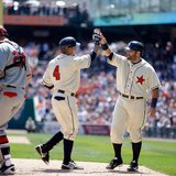 Detroit Tigers 2B Omar Infante (#4) is congratulated by C Alex Avila (R) as Atlanta Braves C Evan Gattis (L) stares down following Infante's two-run home run in the fourth inning of Detroit's 7-4 victory over Atlanta at Comerica Park in Detroit on Apr. 27, 2013. (photo courtesy Detroit Tigers)