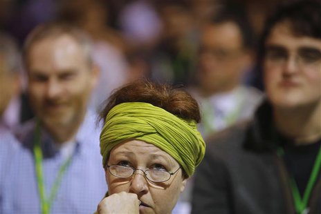 A member of Germany's environmental party Die Gruenen (The Greens) follows a debate during a party congress in Berlin, April 28, 2013. REUTE A member of Germany's environmental party Die Gruenen (The Greens) follows a debate during a party congress in Berlin, April 28, 2013. REUTE