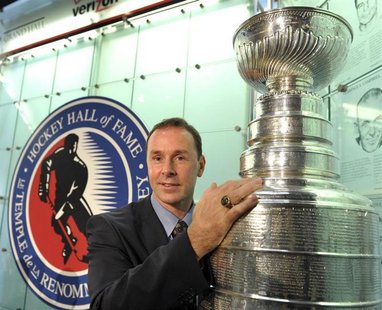 2011 Hockey Hall of Fame inductee Joe Nieuwendyk poses with the Stanley Cup during a news conference in Toronto November 14, 2011. REUTERS/M 2011 Hockey Hall of Fame inductee Joe Nieuwendyk poses with the Stanley Cup during a news conference in Toronto November 14, 2011. REUTERS/M