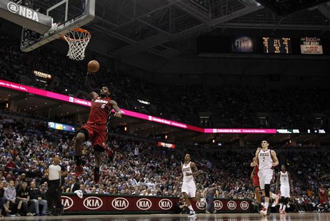 Miami Heat small forward LeBron James goes in for a dunk during the first half of Game 4 of his NBA first round playoff series against the M Miami Heat small forward LeBron James goes in for a dunk during the first half of Game 4 of his NBA first round playoff series against the M