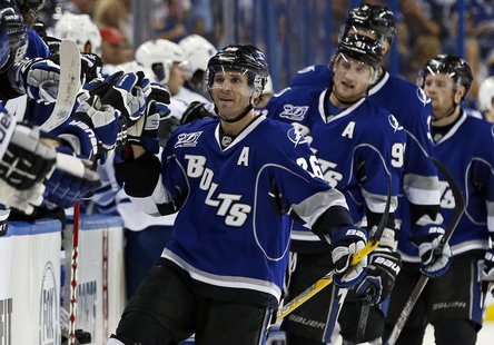 Tampa Bay Lightning's Martin St. Louis celebrates his second goal of the game during the third period of their NHL hockey game against the T Tampa Bay Lightning's Martin St. Louis celebrates his second goal of the game during the third period of their NHL hockey game against the T