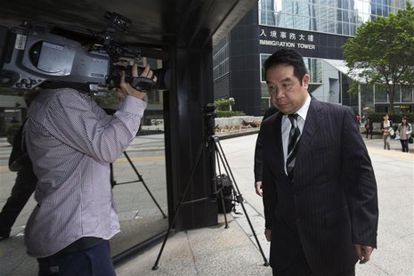 Birmingham City Football Club owner Carson Yeung (R) arrives at a district court in Hong Kong April 29, 2013. Yeung is set to appear in cour Birmingham City Football Club owner Carson Yeung (R) arrives at a district court in Hong Kong April 29, 2013. Yeung is set to appear in cour