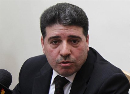 Syrian Prime Minister Wael al-Halki speaks to the media at his office in Damascus, April 3, 2012. REUTERS/Khaled al-Hariri Syrian Prime Minister Wael al-Halki speaks to the media at his office in Damascus, April 3, 2012. REUTERS/Khaled al-Hariri