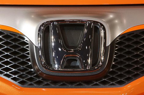 Honda Motor Co Ltd's logo is seen on the company's Sports Modulo Fit concept vehicle displayed at Tokyo Auto Salon 2009 at Makuhari Messe in Honda Motor Co Ltd's logo is seen on the company's Sports Modulo Fit concept vehicle displayed at Tokyo Auto Salon 2009 at Makuhari Messe in