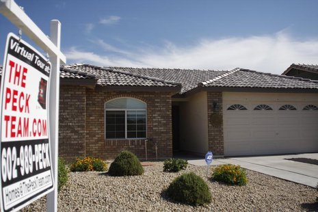 A real estate sales sign sits outside of a house for sale in Phoenix, Arizona June 2, 2009. REUTERS/Joshua Lott A real estate sales sign sits outside of a house for sale in Phoenix, Arizona June 2, 2009. REUTERS/Joshua Lott