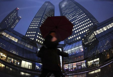 A pedestrian walks past the headquarters of Deutsche Bank in Frankfurt February 24, 2011. REUTERS/Ralph Orlowski A pedestrian walks past the headquarters of Deutsche Bank in Frankfurt February 24, 2011. REUTERS/Ralph Orlowski