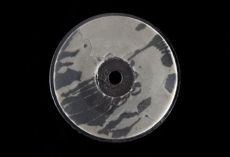 A wax-covered cardboard disc is seen in this undated Smithsonian National Museum of American History image. REUTERS/Smithsonian Institution A wax-covered cardboard disc is seen in this undated Smithsonian National Museum of American History image. REUTERS/Smithsonian Institution