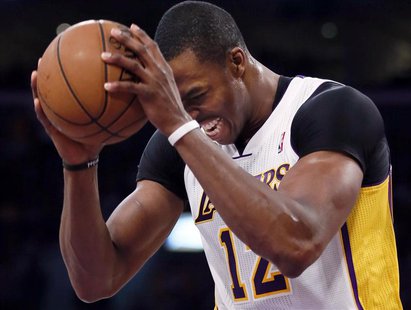 Los Angeles Lakers center Dwight Howard (12) reacts after being fouled by the San Antonio Spurs during Game 4 of their NBA Western Conferenc Los Angeles Lakers center Dwight Howard (12) reacts after being fouled by the San Antonio Spurs during Game 4 of their NBA Western Conferenc